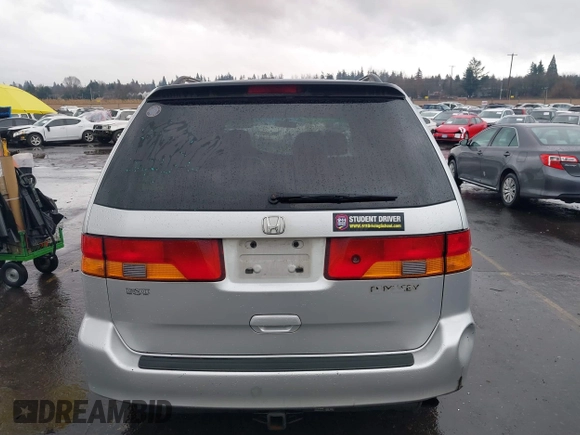 2004 Honda Odyssey EX-L with VIN 5FNRL18934B016420, listed as a IAAI auction lot 41473237 with 188,659 mi miles and . Bid and sale history available at DreamBid. Image 16.