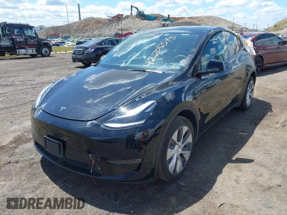 2023 Tesla Model Y Long Range with VIN 7SAYGDEE0PA183891, listed as a IAAI auction lot 42205573 with 41,273 mi miles and . Bid and sale history available at DreamBid. Image 24.