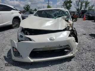2015 Scion FR-S with VIN JF1ZNAA1XF8705667, listed as a Copart auction lot 52681035 with 124,971 mi miles and Salvage Title. Bid and sale history available at carsss.com. Image 5.