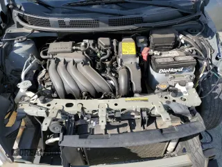 2012 Nissan Versa SV z VIN 3N1CN7AP3CL815189, wystawiony jako Copart lot #61076825 z przebiegiem 192 574 mil mil oraz Szkoda całkowita • Salvage title. Historia ofert i sprzedaży dostępna na DreamBid. Obrazek 11.