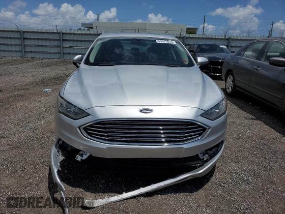 2018 Ford Fusion SE with VIN 3FA6P0LU9JR162110, listed as a Copart auction lot 49335823 with 153,111 mi miles and . Bid and sale history available at DreamBid. Image 5.