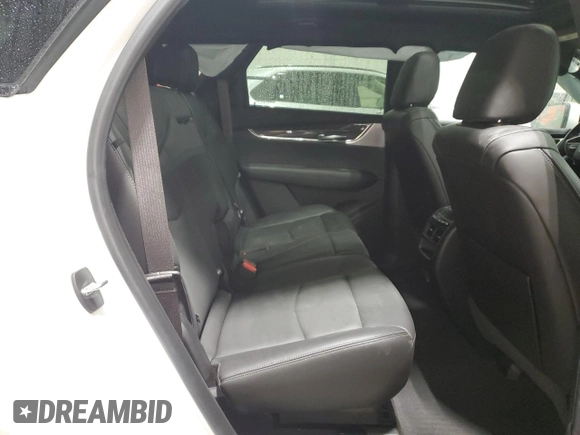 2021 Cadillac XT5 AWD Sport with VIN 1GYKNGRS5MZ142444, listed as a Copart auction lot 54502285 with 27,070 mi miles and Salvage title. Bid and sale history available at DreamBid. Image 11.