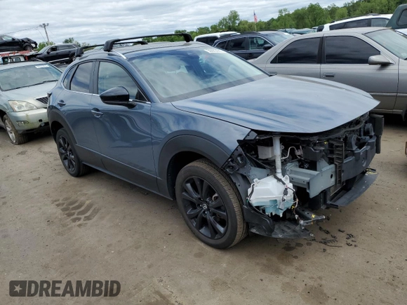 2022 Mazda CX-30 S Carbon Edition with VIN 3MVDMBCL7NM408036, listed as a Copart auction lot 56683665 with 82,337 mi miles and Salvage title. Bid and sale history available at DreamBid. Image 4.