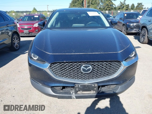 2020 Mazda CX-30 Select with VIN 3MVDMBCL4LM140110, listed as a IAAI auction lot 42194090 with 33,965 mi miles and . Bid and sale history available at DreamBid. Image 13.