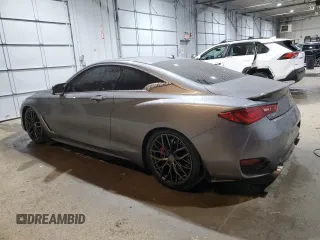 2017 Infiniti Q60 Red Sport 400 with VIN JN1FV7EL0HM701619, listed as a Copart auction lot 82981704 with 58,798 mi miles and Salvage title. Bid and sale history available at DreamBid. Image 2.