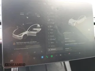 2022 Tesla Model 3 Long Range z VIN 5YJ3E1EB3NF174314, wystawiony jako Copart lot #52713325 z przebiegiem 27 646 mil mil oraz Szkoda całkowita • Salvage title. Historia ofert i sprzedaży dostępna na DreamBid. Obrazek 9.