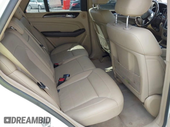 2015 Mercedes-Benz M 350 with VIN 4JGDA5JB5FA500990, listed as a IAAI auction lot 41738851 with 107,749 mi miles and . Bid and sale history available at DreamBid. Image 8.