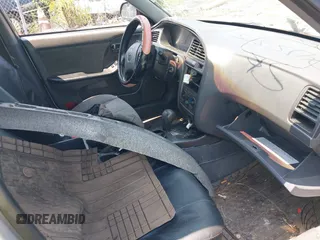 2003 Hyundai Elantra GLS z VIN KMHDN45D63U571345, wystawiony jako IAAI lot #39897105 z przebiegiem 156 805 mil mil oraz . Historia ofert i sprzedaży dostępna na DreamBid. Obrazek 5.