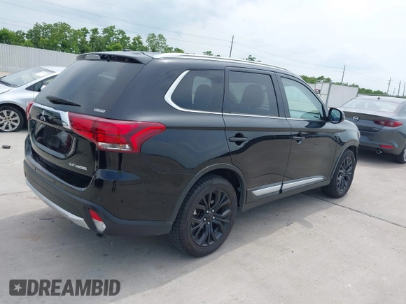 2016 Mitsubishi Outlander GT with VIN JA4JZ4AX3GZ049349, listed as a IAAI auction lot 42476820 with 92,098 mi miles and . Bid and sale history available at DreamBid. Image 4.