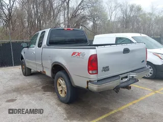 2003 Ford F-150 XL with VIN 1FTRX18L13NA95540, listed as a IAAI auction lot 41879632 with 1 mi miles. Bid and sale history available at carsss.com. Image 3.