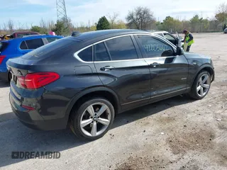 2017 BMW X4 xDrive28i with VIN 5UXXW3C36H0T79679, listed as a IAAI auction lot 42203662 with 137,863 mi miles and . Bid and sale history available at DreamBid. Image 4.