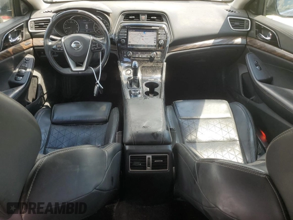 2016 Nissan Maxima Platinum z VIN 1N4AA6AP3GC381177, wystawiony jako Copart lot #58264845 z przebiegiem 122 102 mil mil oraz Szkoda całkowita • Salvage title. Historia ofert i sprzedaży dostępna na DreamBid. Obrazek 8.