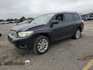 2009 Toyota Highlander Hybrid Limited with VIN JTEEW44A992025930, listed as a Copart auction lot 74084974 with 210,777 mi miles and Salvage Title. Bid and sale history available at carsss.com. Image 1.