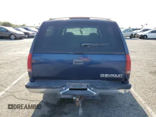 1999 Chevrolet Suburban with VIN 3GNEC16RXXG254126, listed as a Copart auction lot 52051405 with 113,554 mi miles and Clean title. Bid and sale history available at DreamBid. Image 6.