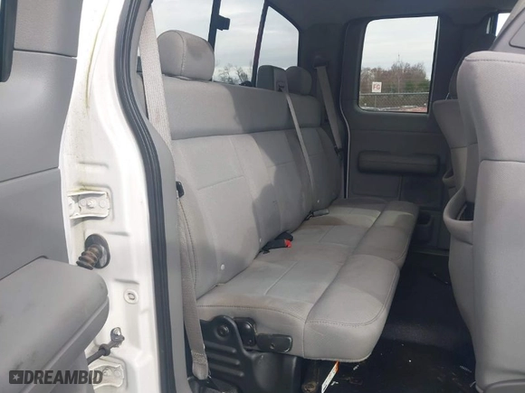 2006 Ford F-150 STX with VIN 1FTRX04W76KB03222, listed as a IAAI auction lot 41970229 with 140,642 mi miles. Bid and sale history available at carsss.com. Image 8.