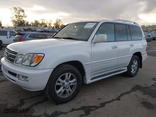 2004 Lexus LX 470 with VIN JTJHT00W743542910, listed as a IAAI auction lot 41357445 with 236,974 mi miles. Bid and sale history available at carsss.com. Image 19.