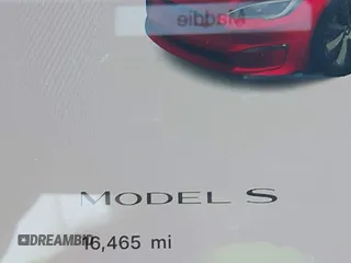 2023 Tesla Model S with VIN 5YJSA1E5XPF516779, listed as a IAAI auction lot 42110737 with 16,465 mi miles and . Bid and sale history available at DreamBid. Image 16.