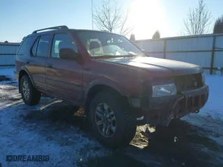 2002 Isuzu Rodeo with VIN 4S2DM58W124319936, listed as a IAAI auction lot 41555285 with 143,035 mi miles. Bid and sale history available at carsss.com. Image 1.