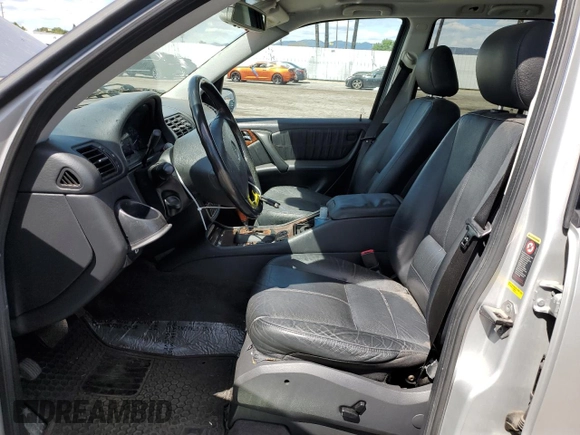 2004 Mercedes-Benz M-Class with VIN 4JGAB75EX4A470494, listed as a Copart auction lot 52024515 with 185,639 mi miles and Salvage Title. Bid and sale history available at carsss.com. Image 7.