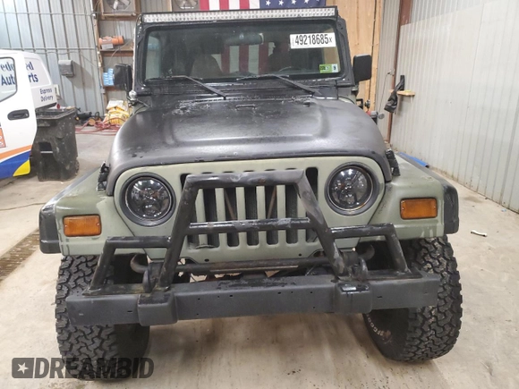 1997 Jeep Wrangler SE with VIN 1J4FY29PXVP476747, listed as a Copart auction lot 49218685 with 165,442 mi miles and Clean Title. Bid and sale history available at carsss.com. Image 5.