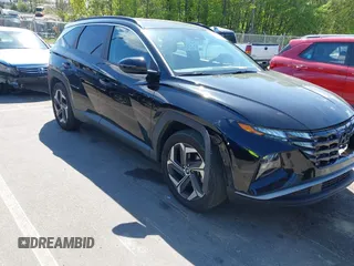 2022 Hyundai Tucson SEL z VIN 5NMJF3AE6NH018945, wystawiony jako IAAI lot #42050780 z przebiegiem 113 680 mil mil oraz . Historia ofert i sprzedaży dostępna na DreamBid. Obrazek 1.