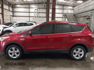 2014 Ford Escape SE z VIN 1FMCU9GX5EUA05294, wystawiony jako IAAI lot #42282028 z przebiegiem 119 046 mil mil oraz . Historia ofert i sprzedaży dostępna na DreamBid. Obrazek 14.