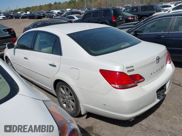2010 Toyota Avalon XL with VIN 4T1BK3DB6AU363456, listed as a IAAI auction lot 41909395 with 251,402 mi miles and . Bid and sale history available at DreamBid. Image 3.