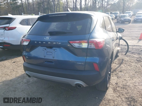 2020 Ford Escape SE Sport Hybrid with VIN 1FMCU9BZ2LUC50527, listed as a IAAI auction lot 41816035 with 84,533 mi miles and . Bid and sale history available at DreamBid. Image 16.