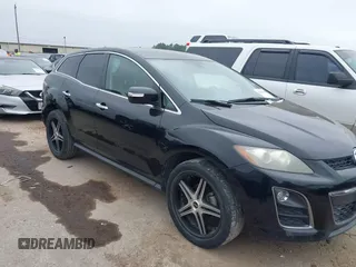 2010 Mazda CX-7 Touring z VIN JM3ER2W31A0351582, wystawiony jako IAAI lot #41891866 z przebiegiem 101 684 mil mil oraz . Historia ofert i sprzedaży dostępna na DreamBid. Obrazek 1.