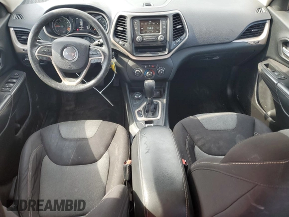 2015 Jeep Cherokee Sport with VIN 1C4PJMAB3FW615621, listed as a Copart auction lot 52330115 with 160,739 mi miles and Salvage title. Bid and sale history available at DreamBid. Image 8.