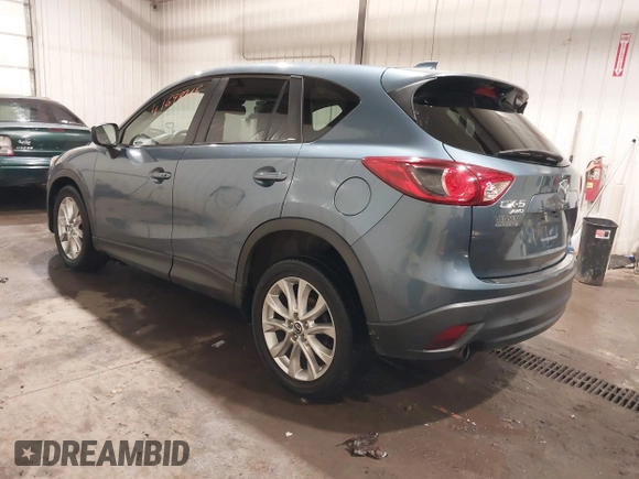 2015 Mazda CX-5 Grand Touring with VIN JM3KE4DY7F0504398, listed as a IAAI auction lot 41698365 with 122,121 mi miles. Bid and sale history available at carsss.com. Image 3.