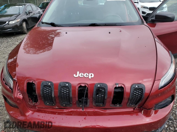 2015 Jeep Cherokee Sport z VIN 1C4PJMAB7FW660058, wystawiony jako Copart lot #56705715 z przebiegiem 87 700 mil mil oraz Szkoda całkowita • Salvage title. Historia ofert i sprzedaży dostępna na DreamBid. Obrazek 12.