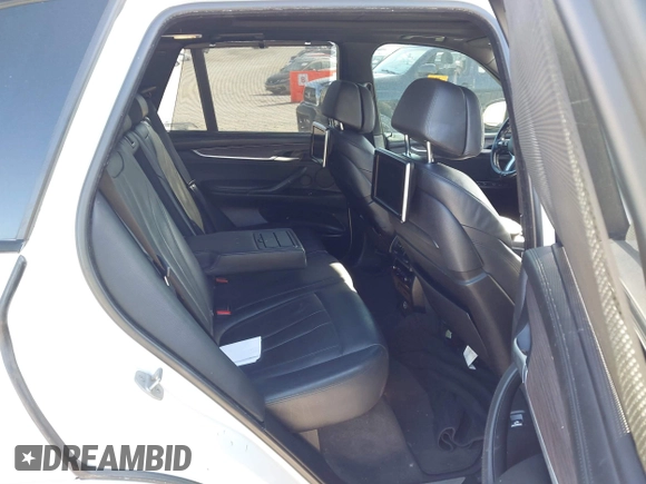 2015 BMW X5 xDrive50i with VIN 5UXKR6C5XF0J76697, listed as a IAAI auction lot 41953074 with 141,377 mi miles and . Bid and sale history available at DreamBid. Image 8.