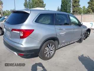 2021 Honda Pilot EX with VIN 5FNYF5H37MB014384, listed as a IAAI auction lot 42412500 with 36,934 mi miles and . Bid and sale history available at DreamBid. Image 4.
