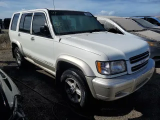 2000 Isuzu Trooper S z VIN JACDS58XXY7J11716, wystawiony jako Copart lot #76685304 z przebiegiem 92 828 mil mil oraz Nie do naprawy. Historia ofert i sprzedaży dostępna na DreamBid. Obrazek 4.