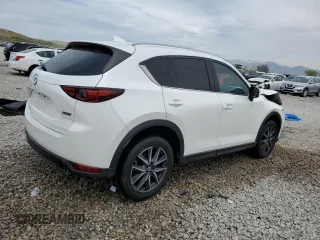 2018 Mazda CX-5 Grand Touring with VIN JM3KFBDM9J0468463, listed as a Copart auction lot 54524805 with 73,389 mi miles and Salvage Title. Bid and sale history available at DreamBid. Image 3.