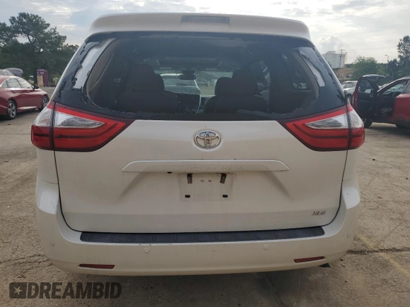 2017 Toyota Sienna XLE Auto Access Seat z VIN 5TDYZ3DC1HS855359, wystawiony jako Copart lot #54170315 z przebiegiem 129 570 mil mil oraz Szkoda całkowita • Salvage title. Historia ofert i sprzedaży dostępna na DreamBid. Obrazek 6.