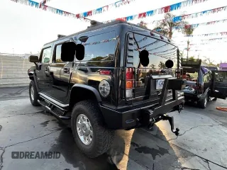 2003 Hummer H2 with VIN 5GRGN23U23H145183, listed as a Copart auction lot 84566884 with 85,945 mi miles and Clean Title. Bid and sale history available at carsss.com. Image 3.