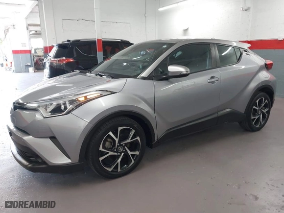 2018 Toyota C-HR XLE with VIN NMTKHMBX0JR015680, listed as a IAAI auction lot 41987642 with 80,367 mi miles. Bid and sale history available at carsss.com. Image 6.