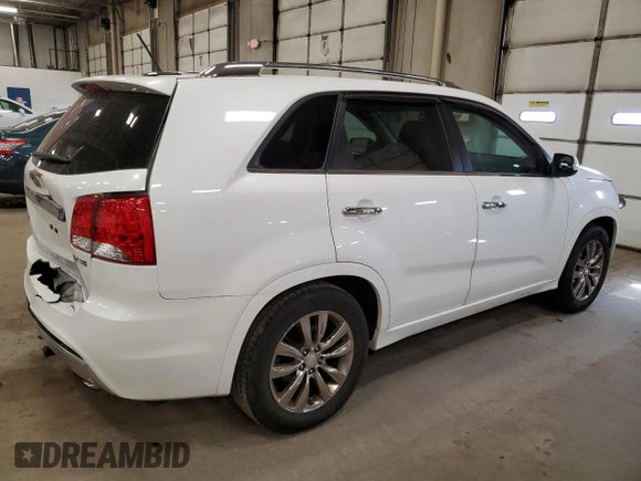 2011 Kia Sorento SX with VIN 5XYKW4A28BG133942, listed as a Copart auction lot 50219905 with 143,515 mi miles and Salvage Title. Bid and sale history available at carsss.com. Image 3.