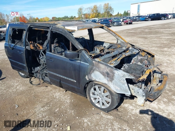 2014 Chrysler Town & Country Touring with VIN 2C4RC1BGXER112283, listed as a IAAI auction lot 40593456 with Not Provided miles and . Bid and sale history available at DreamBid. Image 1.