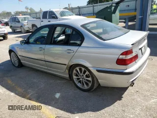 2003 BMW 3 Series 330xi with VIN WBAEW53413PG09450, listed as a Copart auction lot 74111954 with 252,295 mi miles and Salvage Title. Bid and sale history available at carsss.com. Image 2.
