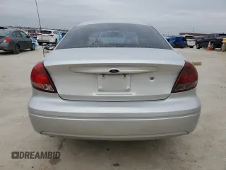 2004 Ford Taurus z VIN 1FAFP52224A203303, wystawiony jako Copart lot #46334175 z przebiegiem 158 832 mil mil oraz Szkody całkowita. Historia ofert i sprzedaży dostępna na DreamBid. Obrazek 6.
