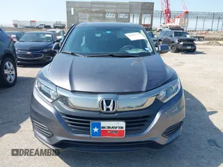 2022 Honda HR-V LX z VIN 3CZRU5H30NM718329, wystawiony jako IAAI lot #42396971 z przebiegiem 28 411 mil mil oraz . Historia ofert i sprzedaży dostępna na DreamBid. Obrazek 12.