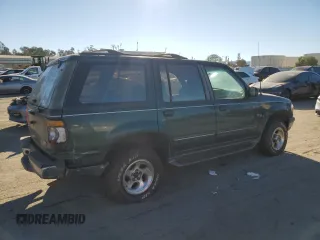 1996 Ford Explorer XL z VIN 1FMDU34X0TUC31973, wystawiony jako Copart lot #87892655 z przebiegiem 142 774 mil mil oraz Tytuł czysty. Historia ofert i sprzedaży dostępna na DreamBid. Obrazek 3.