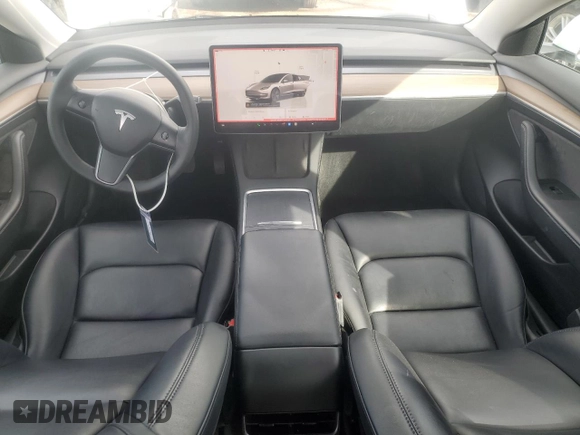 2023 Tesla Model 3 with VIN 5YJ3E1EA9PF546149, listed as a Copart auction lot 52104365 with 34,105 mi miles and Salvage Title. Bid and sale history available at DreamBid. Image 8.