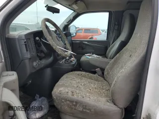 2014 GMC Savana Cargo Van with VIN 1GTW7FCAXE1172325, listed as a Copart auction lot 76668414 with 0 mi miles and Salvage Title. Bid and sale history available at carsss.com. Image 7.
