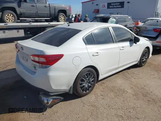 2020 Subaru Impreza with VIN 4S3GKAB67L3609167, listed as a IAAI auction lot 41488542 with 82,418 mi miles and . Bid and sale history available at DreamBid. Image 4.