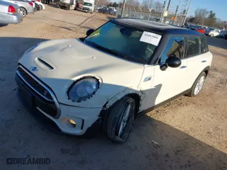 2017 MINI Clubman Cooper S with VIN WMWLU5C53H2E83375, listed as a IAAI auction lot 41663001 with 79,682 mi miles. Bid and sale history available at carsss.com. Image 2.
