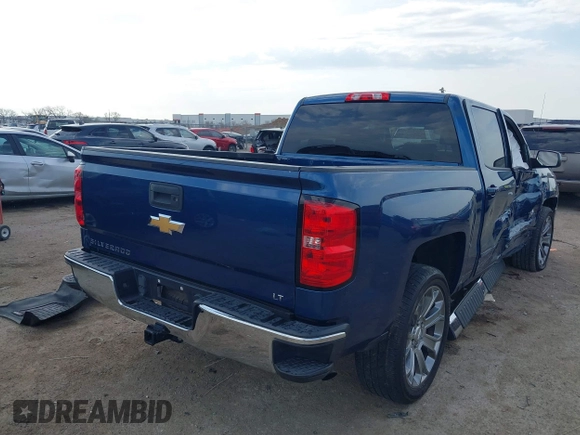 2018 Chevrolet Silverado 1500 LT with VIN 3GCPCREH1JG125997, listed as a IAAI auction lot 41884888 with 122,406 mi miles and . Bid and sale history available at DreamBid. Image 4.